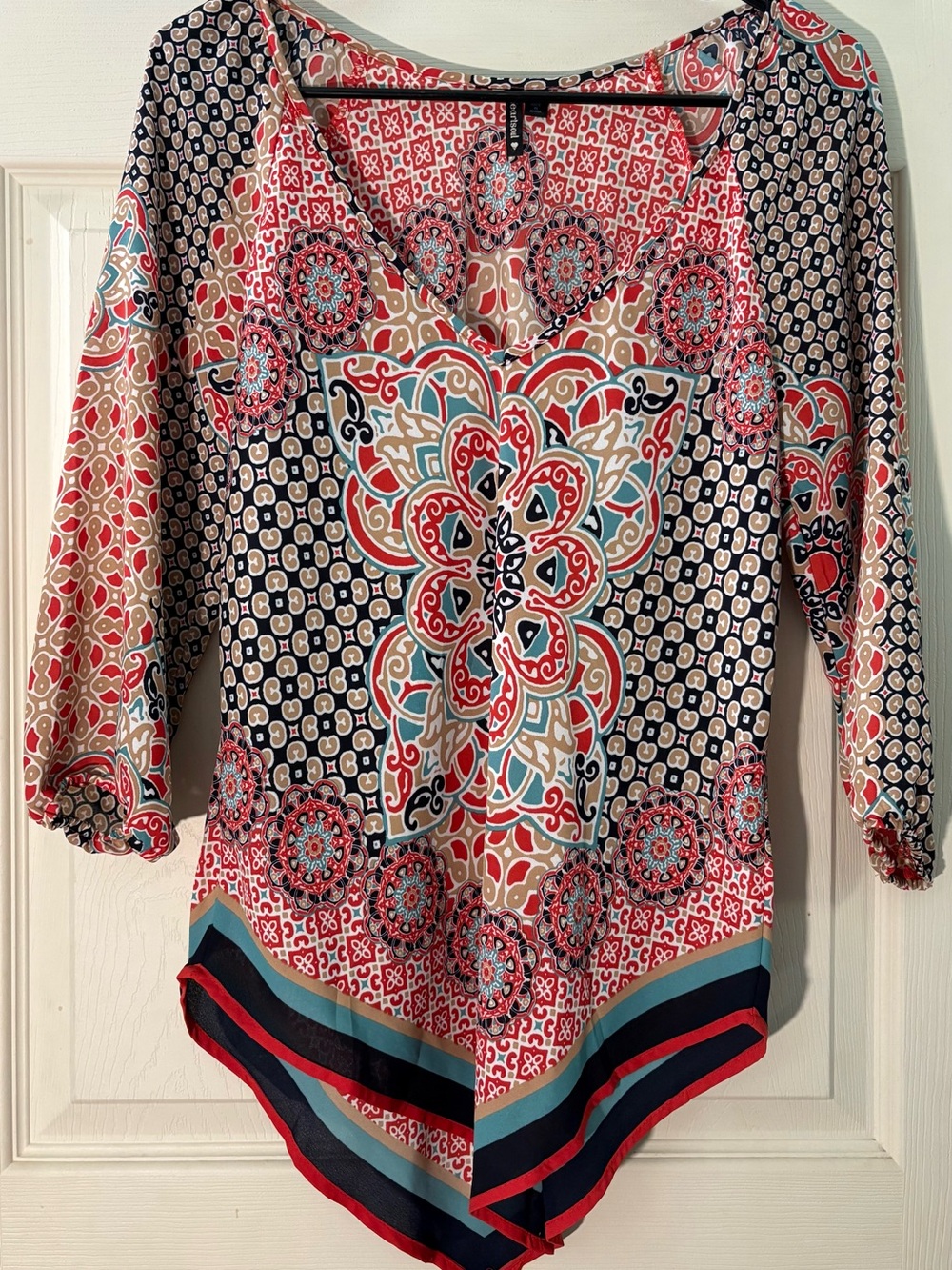 Heartsoul Boho Medallion Print V-Neck with Handkerchief Hem Blouse